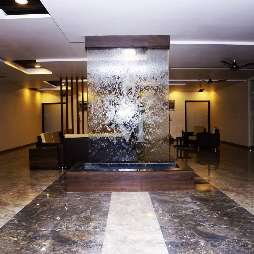 The water feature in the lobby at Meera Celebration