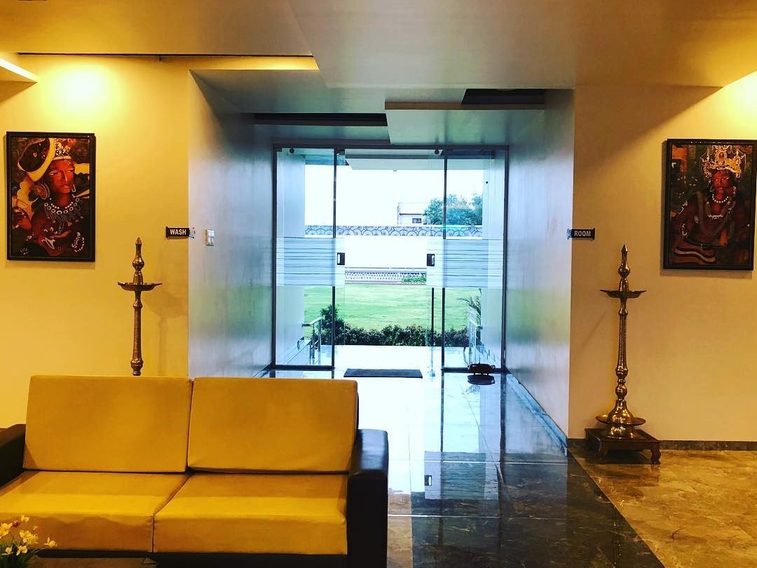 The hotel entrance and lounge at Meera Celebration, Chikhli